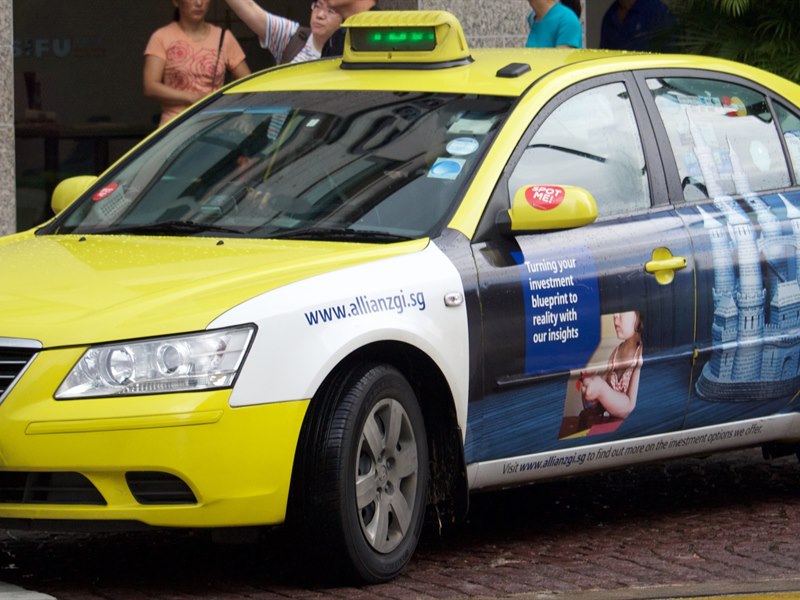 Commercial city taxi cab full body wrap advertising